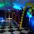 "Cirque du Soleil" theme Bar Mitzvah entrance hallway balloon decor with lighting at Beechmont Country Club.