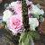 Flower girl basket with pink garden and white garden roses and pink wax flower