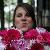 Bouquets of Hot pink Gerbera Daisies, pink roses, and pink peonies with seeded Euc accents
